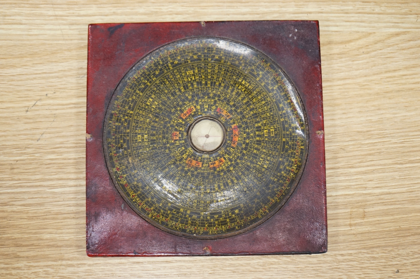 A Regency Morocco leather sewing and writing casket, 26cm and a Chinese Feng shui compass